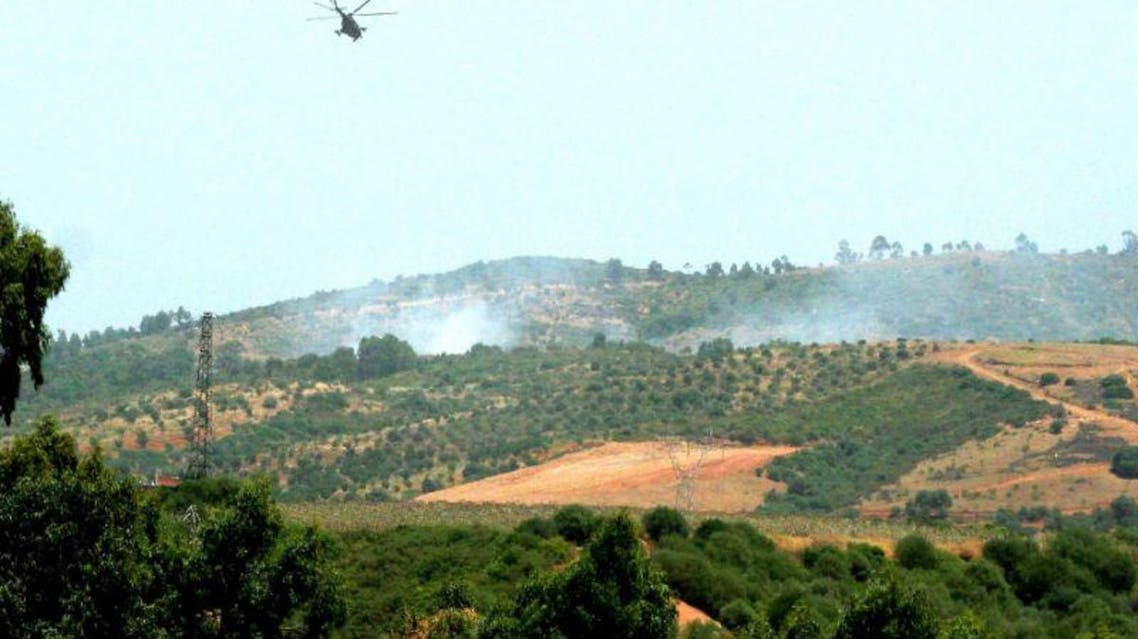An army helicopter flies over an area where the military is fighting armed Islamists, east of Algiers (AFP Photo/)