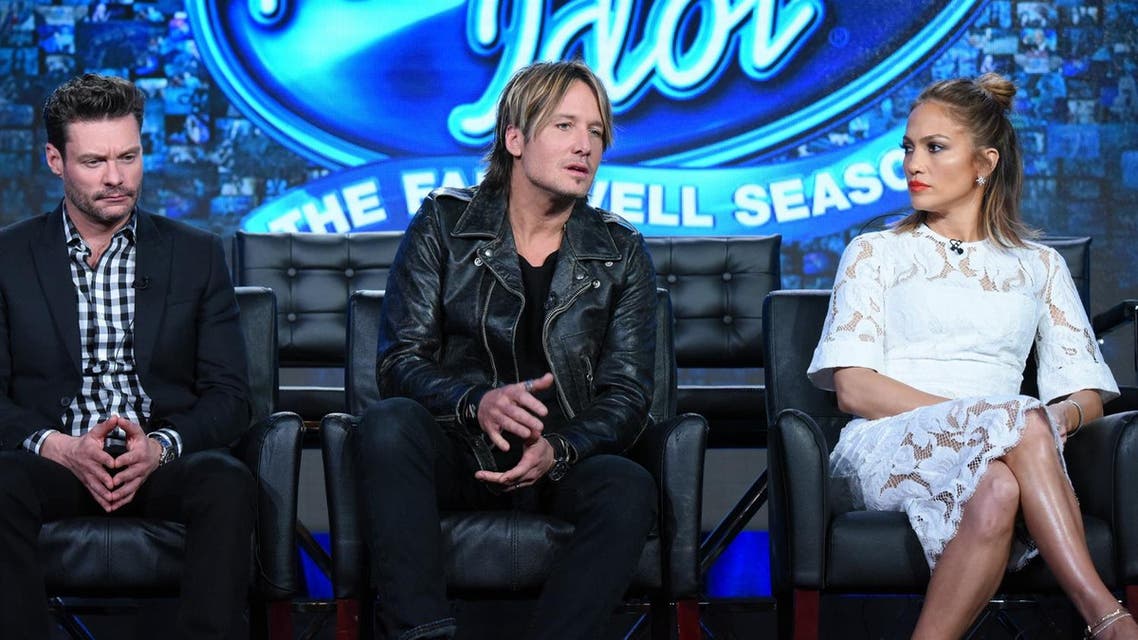 Ryan Seacrest, from left, Keith Urban and Jennifer Lopez participates in the "American Idol" panel at the Fox Winter TCA on Friday, Jan. 15, 2016, Pasadena, Calif. (AP)