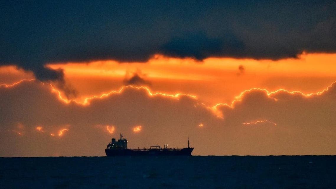 Oil prices climbed in Asia on hopes of an agreement to freeze output and tackle the global supply glut (AFP)