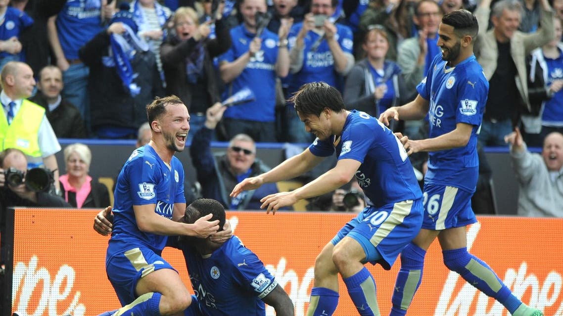 Leicester’s Wes Morgan, 2nd left, celebrates after scoring with Leicester’s Daniel Drinkwater, left, Leicester’s Shinji Okazaki, 2nd right, and Leicester’s Riyad Mahrez during the English Premier League soccer match between Leicester City and Southampton at the King Power Stadium in Leicester, England, Sunday, April 3, 2016. (AP)