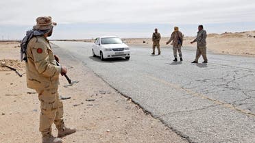 Libyan soldiers manning a military outpost, stop a car at a checkpoint in Wadi Bey, west of the city of Sirte, which is held by Islamic State militants, in this February 23, 2016 (Reuters)
