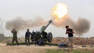 Iraqi security forces fire at Islamic State militants positions from villages south of the Islamic State group-held city of Mosul, Iraq, Saturday, March 26, 2016.(AP)