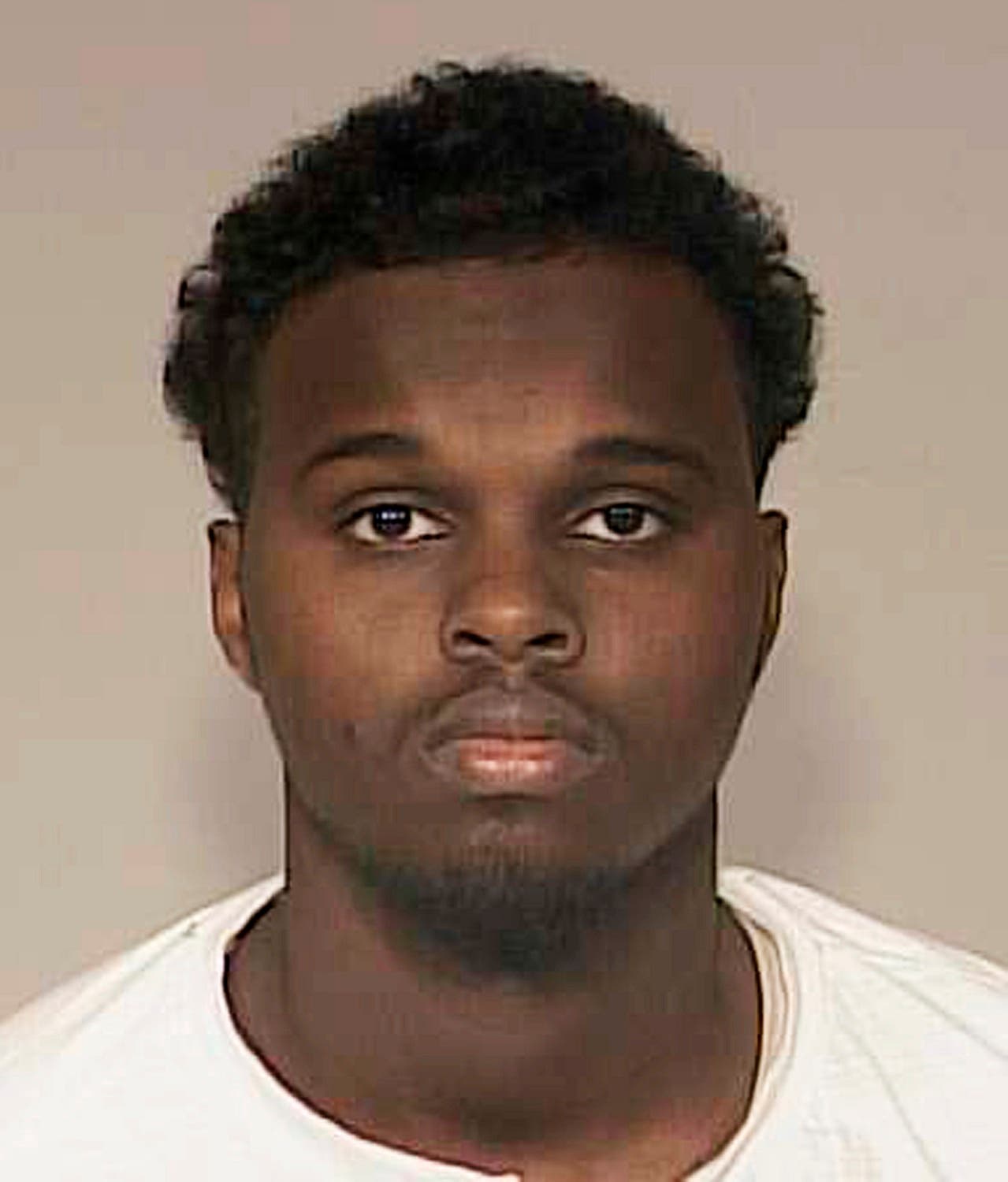 In this December, 2015 photo provided by the Anoka County, Minnesota, Sheriff shows Abdirizak Mohamed Warsame, 20, of Eagan, Minnesota. Warsame was charged Dec. 10, 2015 with conspiracy to support Islamic State for allegedly trying to help other young men from Minnesota's Somali community travel to Syria to fight for the IS. (Anoka County Sheriff via AP,File)