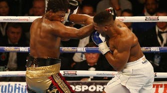 Fast and furious Anthony Joshua wins world heavyweight title 