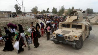 Ex-ISIS Iraq territory reveals mass graves 