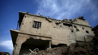 A damaged building is pictured in the rebel-controlled area of Jobar, a suburb of Damascus, Syria March 23, 2016. (Reuters)