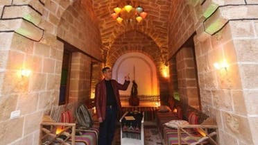 Palestinian university professor Atef Salama stands at his house, a 430-year-old Levantine-style palace, on February 6, 2016, in Gaza City. (File photo: AFP)