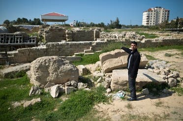 Fadel al-Otol, a Gazan heritage specialist, stands on the ruins of the ancient Saint Hilarion monastery in al-Zawayda, south of Gaza City, on February 28, 2016. (File photo: AFP)