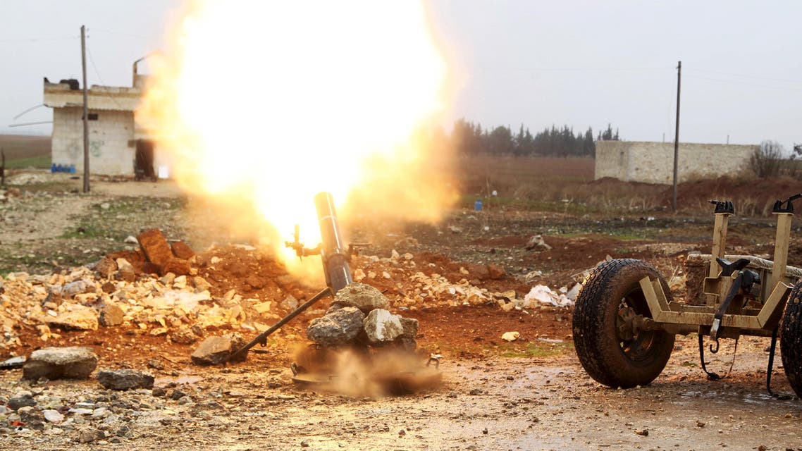 Free Syrian Army fighter fires a shell towards Islamic State fighters in the northern Aleppo countryside, Syria, January 18, 2016. (Reuters)