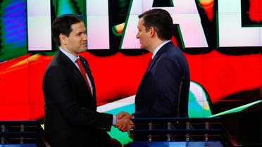 Republican U.S. presidential candidates Marco Rubio (L) and Ted Cruz shake hands at the conclusion of the debate sponsored by CNN for the 2016 Republican U.S. presidential candidates in Houston, Texas, February 25, 2016. (Reuters)