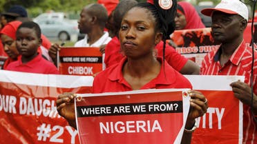Members of the Bring Back Our Girls campaign group take part in a rally on the second anniversary of the abduction of Chibok school girls by Boko Haram, in Abuja, Nigeria, April 14, 2016. REUTERS/Afolabi Sotunde