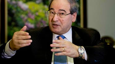 Syrian Deputy Foreign Minister Faisal Mekdad speaks during an interview with The Associated Press at his office in Damascus, Syria, Wednesday, April 13, 2016. Mekdad says that the opposition has to let go of its dream for a transitional government, saying that such a thing amounts to a coup d'etat. Mekdad said that such an idea will never be acceptable. (AP Photo/Hassan Ammar)