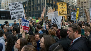 Protesters shout against Republican presidential candidate, Donald Trump, in New York on Thursday, April 14, 2016. (AP)