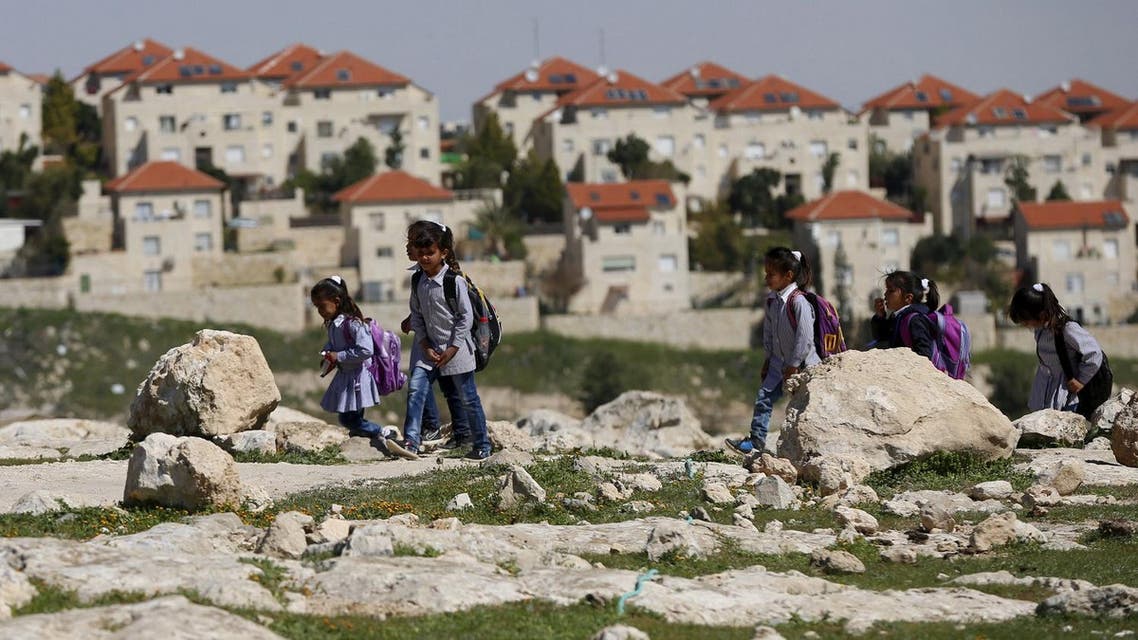 Palestinian bedouin students return from school to their homes near the Jewish settlement of Maale Adumim in the West Bank village of Al-Eizariya, east of Jerusalem March 1, 2016. Reuters