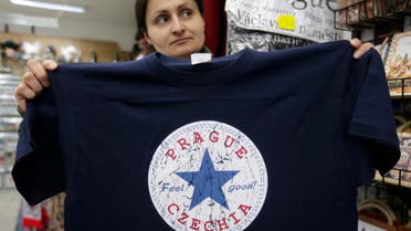 A vendor displays a t-shirt with the word ‘Czechia’ in a store in Prague, Czech Republic, Thursday, April 14, 2016. (AP)