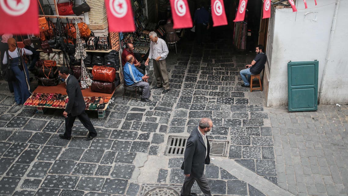 People walk through the Medina market in Tunis, Tunisia, Monday, Oct. 26, 2015. (AP)