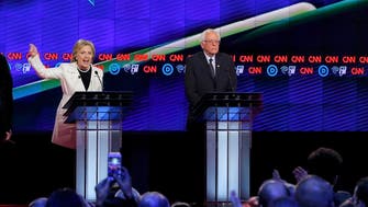 Clinton, Sanders spar in uproarious debate