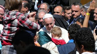 Pope brings 12 Syrian refugees to Italy in lesson for Europe