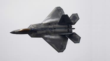 A U.S. Air Force F-22 Raptor fighter jet performs ahead of the International Air and Space Fair (FIDAE) at Santiago international airport, March 28, 2016. (Reuters)