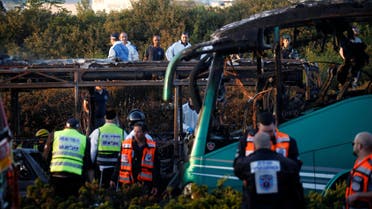 Emergency workers search the scene after a blast on a bus in Jerusalem April 18, 2016. REUTERS
