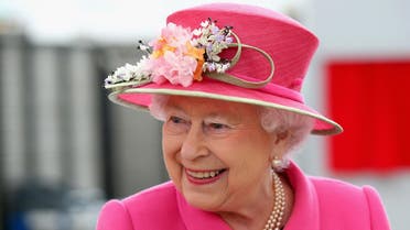 Britain's Queen Elizabeth arrives at the Queen Elizabeth II delivery office in Windsor, England, on Wednesday April 20, 2016.