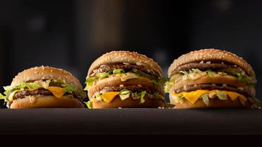 This photo provided by McDonald's shows, from left to right: McDonald's Mac Jr., Big Mac and Grand Mac. McDonald's is testing bigger and smaller versions of its Big Mac as the world's biggest hamburger chain pushes to revive its business. The company says it's testing the Grand Mac and Mac Jr. in the Central Ohio and the Dallas areas, and will see how they do before deciding on a national rollout. (McDonald's via AP)