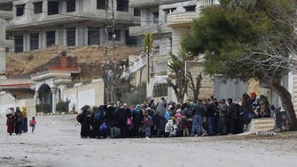 Evacuations begin from blockaded Syrian towns
