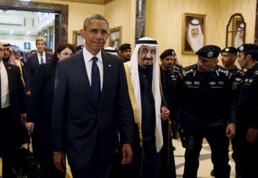 U.S. President Barack Obama (L) walks with Saudi Arabia's King Salman to a meeting at Erga Palace in Riyadh, Saudi Arabia, January 27, 2015. To match Special Report SAUDI-MILITARY/ REUTERS