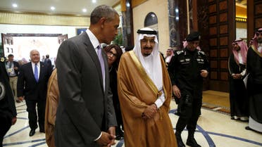 U.S. President Barack Obama walks with Saudi King Salman at Erga Palace upon his arrival for a summit meeting in Riyadh, Saudi Arabia April 20, 2016. 