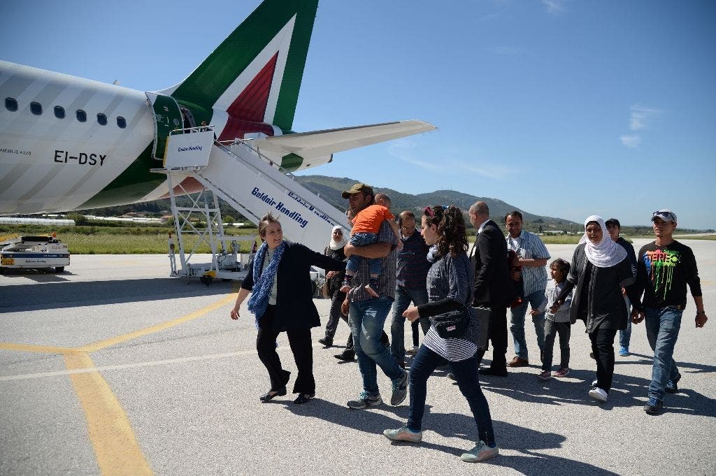 The pope took three Muslim Syrian families whose homes have been bombed back with him to the Vatican with him from the Greek island of Lesbos (AFP)