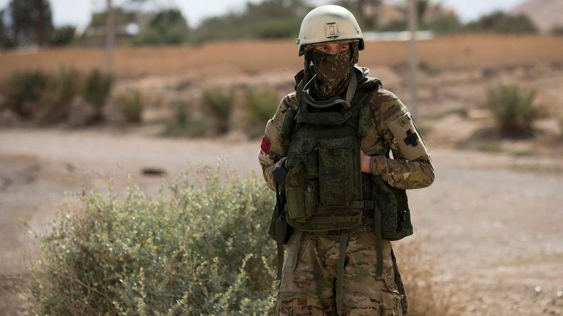 A Russian soldier stands guard in the ancient city of Palmyra in the central Homs province, Syria, Thursday, April 14, 2016. Russian combat engineers are in Syria on a mission to clear mines in Palmyra, which has been recaptured from Islamic State militants in an offensive that has proven Russia's military might in Syria despite a drawdown of its warplanes. (AP)