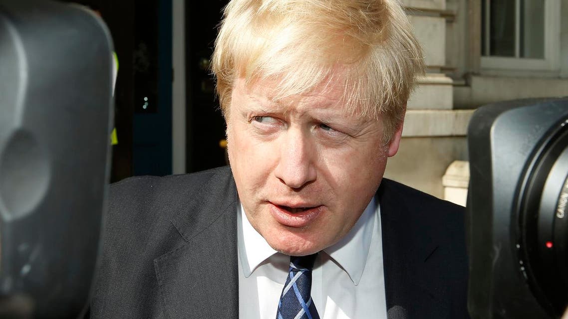London's Mayor Boris Johnson talks to the media as he leaves the Cabinet Office in London, after a government emergency meeting in the wake of the attacks in Brussels, Tuesday, March, 22, 2016. Authorities in Europe and beyond have tightened security at airports, on subways, at the borders and on city streets after deadly attacks Tuesday on the Brussels airport and its subway system. (AP Photo/Alastair Grant)