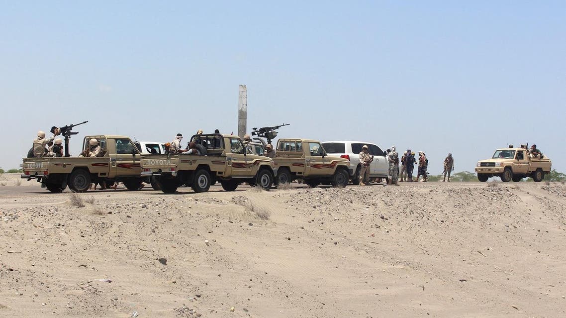 Forces loyal to the Saudi-backed Yemeni president stand guard on a road at the entrance to Abyan province as they take part in an operation to drive Al-Qaeda fighters out of the southern provincial capital, on April 23, 2016 (Photo: AFP)