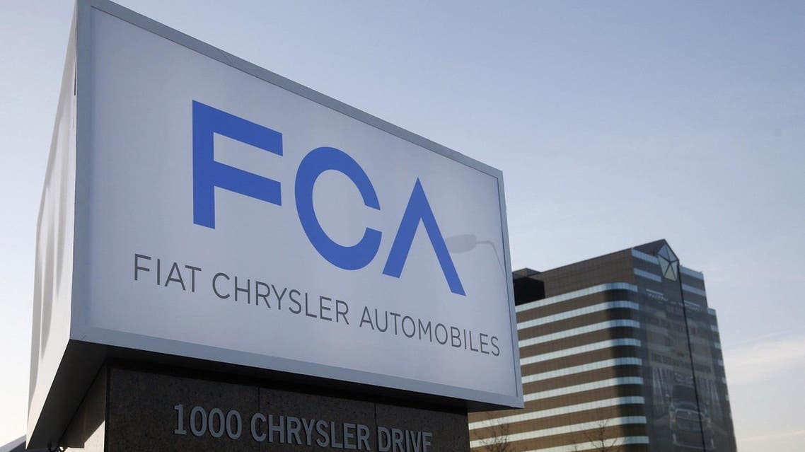 A new Fiat Chrysler Automobiles sign is pictured after being unveiled at Chrysler Group World Headquarters in Auburn Hills, Michigan May 6, 2014. Fiat Chrysler will build Jeeps in China and Brazil and is expected to invest billions of euros to revamp its battered Alfa Romeo sports-car brand in a bid to convince investors it can turn the newly merged automaker into a thriving global business. Chief Executive Sergio Marchionne unveils the group's long-awaited five-year business plan on Tuesday when he is expected to show how Fiat Chrysler can "go on the attack against the giants" in the industry. REUTERS