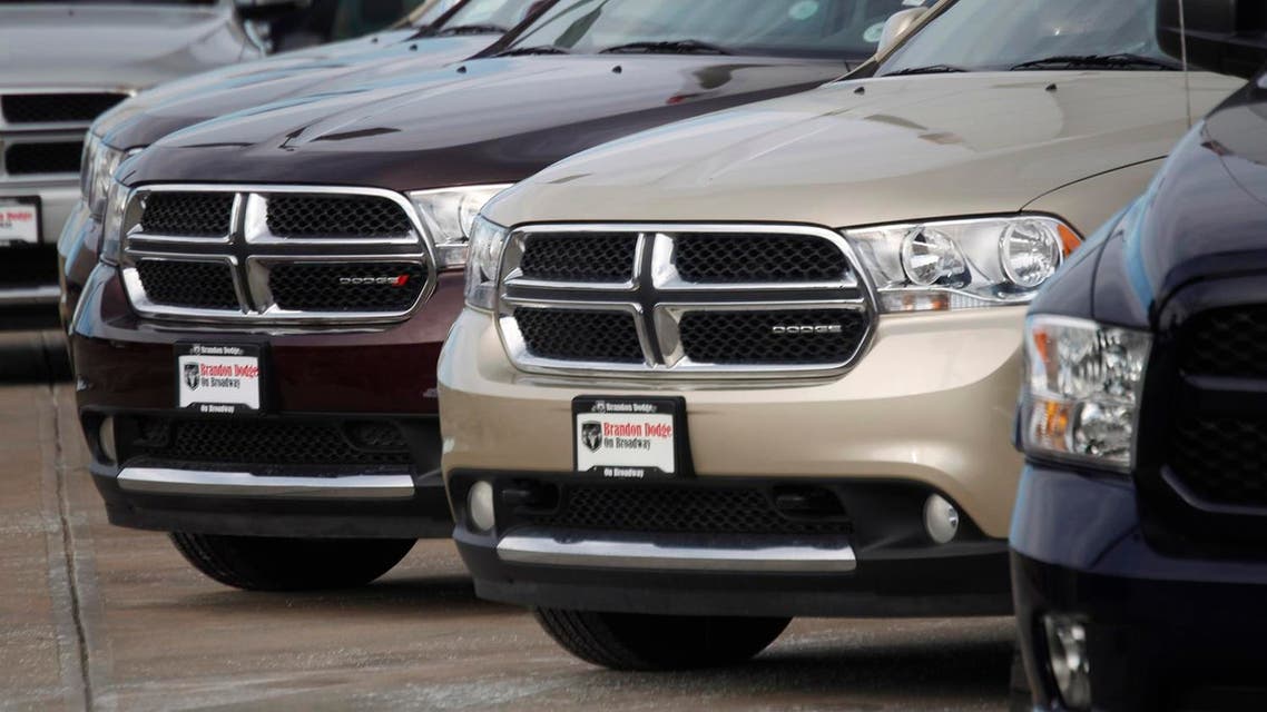 In this Sunday, Jan. 20, 2013, file photo, a line of unsold 2012 Durango sports-utility vehicles sits at a Dodge dealership in Littleton, Colo. Fiat Chrysler is adding more than 467,000 Dodge and Jeep SUVs worldwide to a 2014 recall to fix a potential stalling problem. The company says it's adding 2012 and 2013 Dodge Durangos and 2011 Jeep Grand Cherokees outside North America to a recall from September of last year. The Jeeps have diesel engines. (AP)