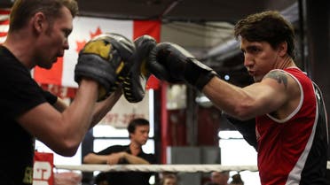 Canadian Prime Minister Justin Trudeau (R) spars with professional boxer Yuri Foreman in the ring at Gleason's Boxing Gym in the Brooklyn borough of New York, US, April 21, 2016. (Reuters)