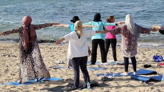 Leaning toward yoga, Tripoli women escape Libya tensions