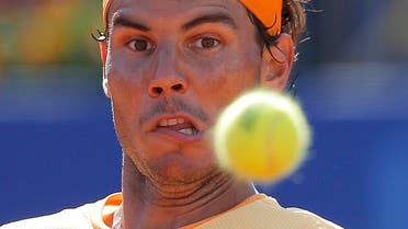 Spain's Rafael Nadal looks at the ball during his match against Philipp Kohlschreiber from Germany at the Barcelona open tennis tournament in Barcelona, Spain, Saturday, April 23, 2016. (AP Photo/Manu Fernandez)