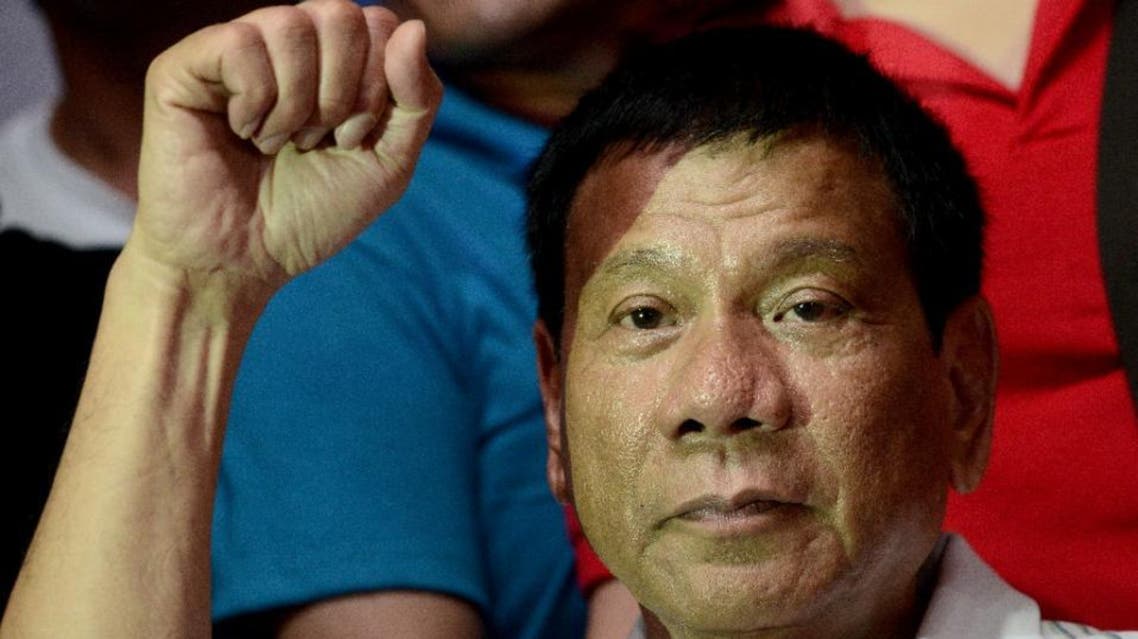 Philippine presidential front-runner candidate Rodrigo Duterte gestures during a campaign in Manila on April 23, 2016 (AFP)
