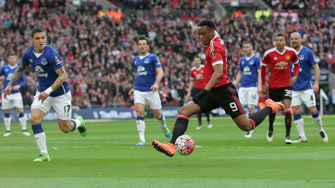 Manchester United's Anthony Martial, No 9, takes a shot on goal during the English FA Cup semifinal between Manchester United and Everton at Wembley in London, Saturday, April 23, 2016. (AP)