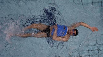 Still swimming in exile, Syrian refugee to carry Rio flame