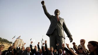 Palestinians unveil 20-foot Mandela statue in Ramallah