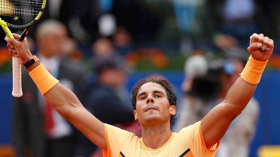 Rafa Nadal celebrates his victory over Fabio Fognini of Italy during the Barcelona open tennis tournament in Barcelona, Spain, Friday, April 22, 2016. (AP)