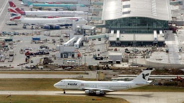 Airplanes sit at stands at terminal five at Heathrow Airport in London, Thursday Aug. 10, 2006. British authorities thwarted a terrorist plot to blow up several aircraft in flight between the United States and the United Kingdom using explosives smuggled in hand luggage, officials said Thursday. (AP Photo/Toby Melville, Pool)