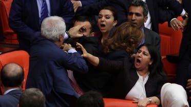 Deputies threw punches, pushed and tried to restrain each other in the assembly late in a row over military operations targeting Kurdish militants. (Reuters)