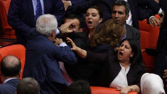 Brawls in Turkish parliament delay legislation on EU migrant deal