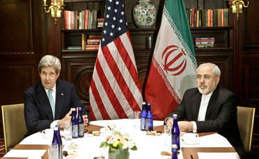 Then-US Secretary of State John Kerry, left, meets with Iranian Foreign Minister Mohammad Javad Zarif on April 22, 2016, in New York. (AP)