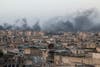 Smoke rises after airstrikes on the rebel-held al-Sakhour neighborhood of Aleppo, Syria April 29, 2016. (Reuters)