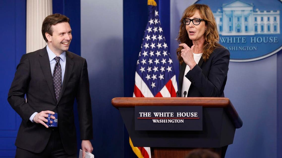 White House Press Secretary Josh Earnest (L) and actress Allison Janney, who played a fictional press secretary in "The West Wing" television show, stand together at the lectern before the daily press briefing at the White House in Washington, U.S., April 29, 2016. REUTERS