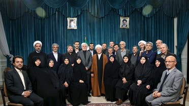 Iran's former president Ali Akbar Hashemi Rafsanjani (C), Iranian former vice president Mohammad Reza Aref (centre, L) and a group of reformists pose for a photo in Tehran February 22, 2016. (Reuters)